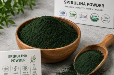 NutriAlgo organic green spirulina powder flatlay on marble background