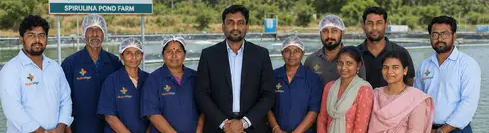 Nutrialgo leadership and team members at the Karaikudi spirulina production facility in Tamil Nadu